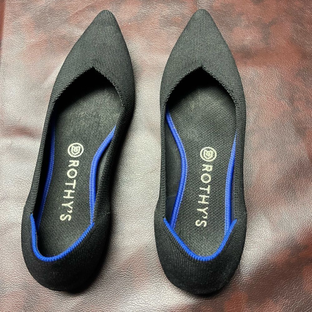 Rothy’s The Point black with blue trim‎ flats, size 9.5